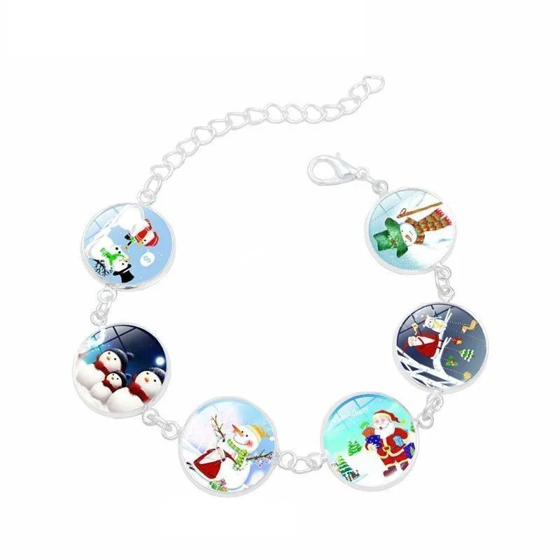 Браслет Снеговики и Санта. Светятся в темноте. Цвет серебро.