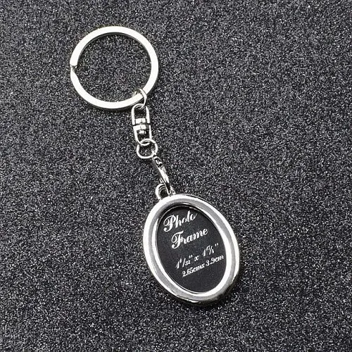 Брелок Фоторамка овальная. Цвет стальной.